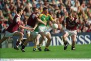 23 September 2001; Evan Kelly of Meath in action against Joe Bergin, left, Sean Og De Paor, centre, and Gary Fahey of Galway during the GAA Football All-Ireland Senior Championship Final match between Galway and Meath at Croke Park in Dublin. Photo by Aoife Rice/Sportsfile