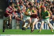 23 September 2001; Evan Kelly of Meath in action against Joe Bergin, left, and Sean Og De Paor of Galway during the GAA Football All-Ireland Senior Championship Final match between Galway and Meath at Croke Park in Dublin. Photo by Aoife Rice/Sportsfile