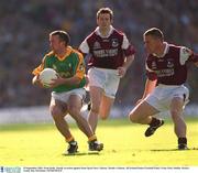 23 September 2001; Evan Kelly of Meath in action against Sean Og de Paor of Galway during the GAA Football All-Ireland Senior Championship Final match between Galway and Meath at Croke Park in Dublin. Photo by Ray McManus/Sportsfile