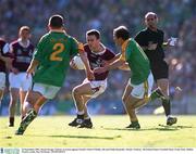 23 September 2001; Derek Savage of Galway in action against Mark O'Reilly, left, and Paddy Reynolds of Meath during the GAA Football All-Ireland Senior Championship Final match between Galway and Meath at Croke Park in Dublin. Photo by Ray McManus/Sportsfile