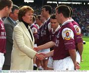23 September 2001; President Mary McAleese with Padraig Joyce of Galway prior to the GAA Football All-Ireland Senior Championship Final match between Galway and Meath at Croke Park in Dublin. Photo by Ray McManus/Sportsfile