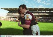 23 September 2001; Jarlath Fallon of Galway is congratulated by a Galway supporter following the GAA Football All-Ireland Senior Championship Final match between Galway and Meath at Croke Park in Dublin. Photo by Damien Eagers/Sportsfile