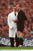 23 September 2001; Referee Michael Collins consults with one of his umpires during the GAA Football All-Ireland Senior Championship Final match between Galway and Meath at at Croke Park in Dublin. Photo by Brendan Moran/Sportsfile