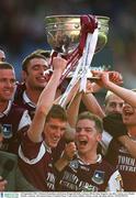 23 September 2001; Michael Donnellan and Kieran Fitzgerald, left, of Galway lift the Sam Maguire cup following the GAA Football All-Ireland Senior Championship Final match between Galway and Meath at Croke Park in Dublin. Photo by Brendan Moran/Sportsfile