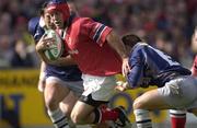 29 September 2001; Munster's Mike Mullins is tackled by Romain Teulet, Castres. Munster v Castres, Heineken European Cup, Thomond Park, Limerick, Ireland. Rugby. Picture credit; Brendan Moran / SPORTSFILE *EDI*