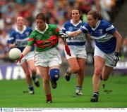 30 September 2001; Mayo's Denise McDonagh is tackled by Laois's Margaret Phelan-Mulhall. Laois v Mayo, All Ireland Ladies Senior Football Final. Croke Park, Dublin. Picture credit; Aoife Rice / SPORTSFILE