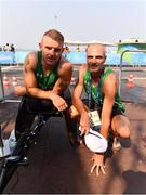 18 September 2016; Patrick Monahan of Ireland, along with team leader James Nolan, after completing the T54 Men's Marathon at Fort Copacabana during the Rio 2016 Paralympic Games in Rio de Janeiro, Brazil. Photo by Diarmuid Greene/Sportsfile