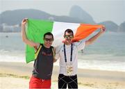 18 September 2016; Jason Smyth, left, and Michael McKillop of Ireland on the Copacabana beach where they gathered to support Patrick Monahan of Ireland, during the T54 Men's Marathon at Fort Copacabana during the Rio 2016 Paralympic Games in Rio de Janeiro, Brazil. Photo by Diarmuid Greene/Sportsfile