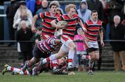 26 January 2011; Greg Hawe, Wesley College, goes past the tackle of Zeebhan Ali, Templeogue College. Powerade Leinster Schools Rugby Vinnie Murray Cup 2nd Round, Templeogue College v Wesley College, Old Belvedere RFC, Donnybrook, Dublin. Picture credit: Matt Browne / SPORTSFILE