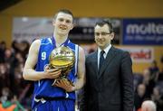 26 January 2011; Neil Lynch, St. Fintan's, Sutton, Dublin, is presented with his MVP award by Shane Whelan, Basketball Ireland Communications Manager. Basketball Ireland Boys U19A Schools Cup Final, St. Fintan's, Sutton, Dublin v Colaiste Eanna, Dublin, National Basketball Arena, Tallaght, Dublin. Picture credit: Stephen McCarthy / SPORTSFILE