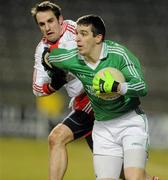 26 January 2011; Barry Owens, Fermanagh, in action against Mark Donnelly, Tyrone. Barrett Sports Lighting Dr. McKenna Cup Section A, Fermanagh v Tyrone, Brewster Park, Enniskillen, Co. Fermanagh. Picture credit: Oliver McVeigh / SPORTSFILE