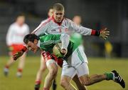 26 January 2011; James Sherry, Fermanagh, in action against Kevin Hughes, Tyrone. Barrett Sports Lighting Dr. McKenna Cup Section A, Fermanagh v Tyrone, Brewster Park, Enniskillen, Co. Fermanagh. Picture credit: Oliver McVeigh / SPORTSFILE