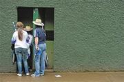 18 July 2010; Monaghan supporters queue to enter the ground through a turnstile. Monaghan v Tyrone, Ulster GAA Football Senior Championship Final, St Tighearnach's Park, Clones, Co. Monaghan. Picture credit: Brendan Moran / SPORTSFILE