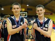 27 January 2011; Colaiste Mhuire joint captains Colin Curran, left, and Jordan Murphy, with the cup. Basketball Ireland Boys U16B Schools Cup Final, Colaiste Mhuire, Crosshaven, Cork v St. Muredach's, Ballina, Co. Mayo, National Basketball Arena, Tallaght, Dublin. Picture credit: Brian Lawless / SPORTSFILE