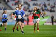 18 September 2016; Oisín Hooney, Ballyadams NS, Ballyadams, Laois, representing Dublin, in action against Shonagh Fitzpatrick, St Finian's Waterville, Kerry, representing Mayo, during the INTO Cumann na mBunscol GAA Respect Exhibition Go Games at the GAA Football All-Ireland Senior Championship Final match between Dublin and Mayo at Croke Park in Dublin. Photo by Ray McManus/Sportsfile