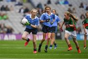 18 September 2016; Coragh Leenon, Latton NS, Castleblayney, Monaghan, representing Dublin, in action against Sarah Jane Reid, St Joseph's NS, Dundalk, Louth, representing Mayo, during the INTO Cumann na mBunscol GAA Respect Exhibition Go Games at the GAA Football All-Ireland Senior Championship Final match between Dublin and Mayo at Croke Park in Dublin. Photo by Ray McManus/Sportsfile