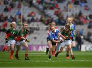 18 September 2016; Rachel O'Brien, Newtown Dunleckney, Bagenalstown, Carlow, representing Dublin, in action against Eimear Scullion, St Treas, Ballyronan, Derry, representing Mayo, left, and Laura Casey, St Manachans NS, Mohill, Leitrim, representing Mayo, during the INTO Cumann na mBunscol GAA Respect Exhibition Go Games at the GAA Football All-Ireland Senior Championship Final match between Dublin and Mayo at Croke Park in Dublin. Photo by Ray McManus/Sportsfile