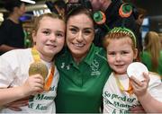 21 September 2016; Cyclist pilot Eve McCrystal of Ireland with her daughters Ava, left, age 8, and Nessa, age 7, holding her medals during their homecoming from the Rio 2016 Paralympic Games at Dublin Airport in Dublin. Photo by Cody Glenn/Sportsfile