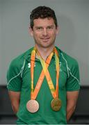 21 September 2016; Double medal cyclist Eoghan Clifford with his gold and bronze won in the Men's C3 Time Trial and Men's C3 3000m Individual Pursuit Final during the homecoming from the Rio 2016 Paralympic Games at Dublin Airport in Dublin. Photo by Cody Glenn/Sportsfile