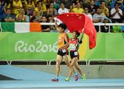 17 September 2016; Jin Zheng of China, along with her guide Yubo Jin, celebrates after winning the Women's 1500m - T11 Final at the Olympic Stadium during the Rio 2016 Paralympic Games in Rio de Janeiro, Brazil. Photo by Diarmuid Greene/Sportsfile