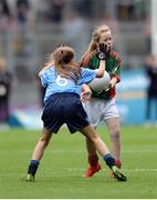 18 September 2016; Sarah Jane Reid, St Joseph's NS, Dundalk, Louth, representing Mayo, in action against Keelan Murphy, St Naile's PS, Kinawley, Fermanagh, representing Dublin,  during the INTO Cumann na mBunscol GAA Respect Exhibition Go Games at the GAA Football All-Ireland Senior Championship Final match between Dublin and Mayo at Croke Park in Dublin. Photo by Eóin Noonan/Sportsfile