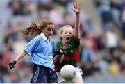 18 September 2016; Keelan Murphy, St Naile's PS, Kinawley, Fermanagh, representing Dublin, in action against Nadine Hargadon, Cloghogue NS, Castlebaldwin, Sligo, reresenting Mayo during the INTO Cumann na mBunscol GAA Respect Exhibition Go Games at the GAA Football All-Ireland Senior Championship Final match between Dublin and Mayo at Croke Park in Dublin. Photo by Eóin Noonan/Sportsfile