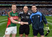 18 September 2016; Mayo captain Cillian O'Connor shakes hands with Dublin captain Stephen Cluxton in the presence of referee Conor Lane, ahead of the GAA Football All-Ireland Senior Championship Final match between Dublin and Mayo at Croke Park in Dublin. Photo by Ray McManus/Sportsfile