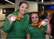 21 September 2016; Orla Barry, left, from  Ladysbridge, Co Cork, who won silver in the Women's Discus F57 Final, and Niamh McCarthy, from Carrigaline, Co Cork, who won silver in the Women's Discus Throw F41 Final, display their medals during their homecoming from the Rio 2016 Paralympic Games at Dublin Airport in Dublin. Photo by Cody Glenn/Sportsfile