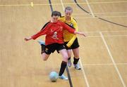 29 January 2011; Olivia Lyons, UCC, in action against Megan Brick, NUI Maynooth. Group 1 Qualifier, Womens Soccer Colleges Association of Ireland National Futsal Finals, University of Limerick, Limerick. Picture credit: Diarmuid Greene / SPORTSFILE