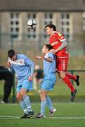 29 January 2011; Ryan Gyaki, Cork City, heads the ball away from Brendan Frahill, centre, and Conor Meade, left, Cobh Ramblers. Airtricity League Friendly, Cork City v Cobh Ramblers, Bishopstown Stadium, Bishopstown, Co. Cork. Picture credit: Barry Cregg / SPORTSFILE