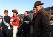 30 January 2011; Jockey Paul Townend and trainer Willie Mullins, right, after their horse Golden Silver won the Boylesports.com Tied Cottage Steeplechase. Horse Racing, Punchestown Racecourse, Punchestown, Co. Kildare. Photo by Sportsfile