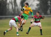 30 January 2011; Fergus McAuliffe, Gneeveguilla, in action against Johnny Duane, left, and Eoin Concannon, St James. AIB GAA Football All-Ireland Intermediate Club Championship Semi-Final, St James v Gneeveguilla, Mallow GAA & Sports Complex, Mallow, Co. Cork. Picture credit: Stephen McCarthy / SPORTSFILE