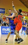 30 January 2010; Barry Glover, UCD Marian, in action against Jermaine Turner, 11890 Killester. Men's Superleague National Cup Final, 11890 Killester v UCD Marian, National Basketball Arena, Tallaght, Dublin. Picture credit: Brendan Moran / SPORTSFILE