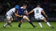 23 September 2016; Garry Ringrose of Leinster is tackled by Justin Tipuric, left, and Tyler Ardron of Ospreys during the Guinness PRO12 Round 4 match between Leinster and Ospreys at the RDS Arena in Dublin. Photo by Stephen McCarthy/Sportsfile