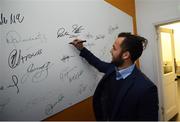 23 September 2016; Leinster's Jamison Gibson-Park signs the wall at the Laighin Out Supporters Bar before a Q&A session following the Guinness PRO12, Round 4, match between Leinster and Ospreys at the RDS Arena in Dublin. Photo by Stephen McCarthy/Sportsfile