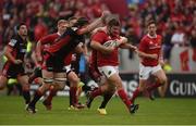 24 September 2016; Duncan Casey of Munster is tackled by Ben Toolis and Glenn Bryce of Edinburgh Rugby during the Guinness PRO12 Round 4 match between Munster and Edinburgh Rugby at Thomond Park in Limerick. Photo by Diarmuid Greene/Sportsfile