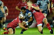 24 September 2016; Bundee Aki of Connacht is tackled by Aled Thomas and Liam Williams of Scarlets during the Guinness PRO12 Round 4 match between Scarlets and Connacht at Parc Y Scarlets, Llanelli in Wales. Photo by Chris Fairweather/Sportsfile