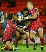 24 September 2016; Bundee Aki of Connacht is tackled by Aled Thomas and Liam Williams of Scarlets during the Guinness PRO12 Round 4 match between Scarlets and Connacht at Parc Y Scarlets, Llanelli in Wales. Photo by Chris Fairweather/Sportsfile