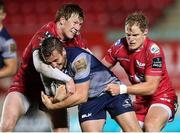 24 September 2016; Jack Carty of Connacht is tackled by Rhys Patchell and Aled Davies of Scarlets during the Guinness PRO12 Round 4 match between Scarlets and Connacht at Parc Y Scarlets, Llanelli in Wales. Photo by Chris Fairweather/Sportsfile