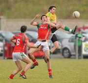 30 January 2011; Darren Sweeney, Leitrim, in action against James Moran, Mayo. FBD Connacht League Group 2, Leitrim v Mayo, Seán O'Heslin's GAA Club, Ballinamore, Co. Leitrim. Picture credit: Oliver McVeigh / SPORTSFILE