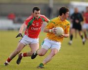 30 January 2011; Barry Prior, Leitrim, in action against Aidan Campbell, Mayo. FBD Connacht League Group 2, Leitrim v Mayo, Seán O'Heslin's GAA Club, Ballinamore, Co. Leitrim. Picture credit: Oliver McVeigh / SPORTSFILE