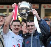30 January 2011; Kildare captain Eamonn Callaghan, left , lifts the O'Byrne Cup at the end of the game with team-mate John Doyle. O'Byrne Cup Final, Kildare v Louth, St Conleth's Park, Newbridge, Co. Kildare. Picture credit: David Maher / SPORTSFILE