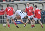 30 January 2011; Derek Crill, Louth, tackles Eamonn Callaghan, Kildare. O'Byrne Cup Final, Kildare v Louth, St Conleth's Park, Newbridge, Co. Kildare. Picture credit: David Maher / SPORTSFILE