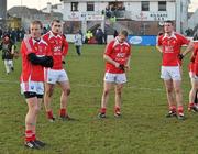 30 January 2011; Dejected Louth players, left to right, J.P Rooney, Paddy Keenan, Ray Finnegan and Ronan Carroll at the end of the game. O'Byrne Cup Final, Kildare v Louth, St Conleth's Park, Newbridge, Co. Kildare. Picture credit: David Maher / SPORTSFILE