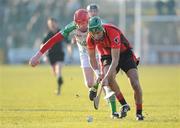 30 January 2011; Keith Rossiter, Oulart the Ballagh, in action against Peter Dowling, O'Loughlin Gaels. AIB Leinster GAA Hurling Senior Club Championship Final, O'Loughlin Gaels v Oulart the Ballagh, Dr. Cullen Park, Carlow. Picture credit: Matt Browne / SPORTSFILE