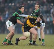 30 January 2011; Shane Doolan, Dr. Crokes, in action against Alan Cronin, left, and Paul Kerrigan, Nemo Rangers. AIB Munster GAA Football Senior Club Championship Final, Dr. Crokes v Nemo Rangers, Mallow Gaa & Sports Complex, Mallow, Co. Cork. Picture credit: Barry Cregg / SPORTSFILE