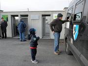 30 January 2011; A general view of a father and son getting their tickets before the game. FBD Connacht League Group 2, Leitrim v Mayo, Seán O'Heslin's GAA Club, Ballinamore, Co. Leitrim. Picture credit: Oliver McVeigh / SPORTSFILE