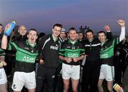 30 January 2011; Nemo Rangers players, including Ciaran O'Shea, 4, James Masters, 22, and Brian Twomey, 20, celebrate their side's victory. AIB Munster GAA Football Senior Club Championship Final, Dr. Crokes v Nemo Rangers, Mallow GAA & Sports Complex, Mallow, Co. Cork. Picture credit: Stephen McCarthy / SPORTSFILE