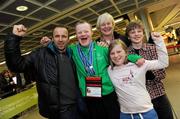 30 January 2011; Team Ireland's, Ben Purcell, from Dalkey, Co. Dublin, who came fourth in the Giant Slalom and fouth in the Slalom, with his father Tony Purcell, his mother Valerie Reid, his sister Molly, aged 10, and his brother Harry, aged 13, on his return to Dublin Airport following the Special Olympics European Ski Alpine Cup 2011 in Austria. Dublin Airport, Dublin. Picture credit: Brian Lawless / SPORTSFILE