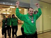 30 January 2011; Team Ireland's Cormac Maguire, from Ballinteer, Co. Dublin, who won gold in the Slalom and fourth in the Giant Slalom on his return to Dublin following the Special Olympics European Ski Alpine Cup 2011 in Austria. Dublin Airport, Dublin. Picture credit: Brian Lawless / SPORTSFILE